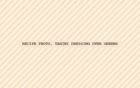 Recipe photo: tahini dressing over greens